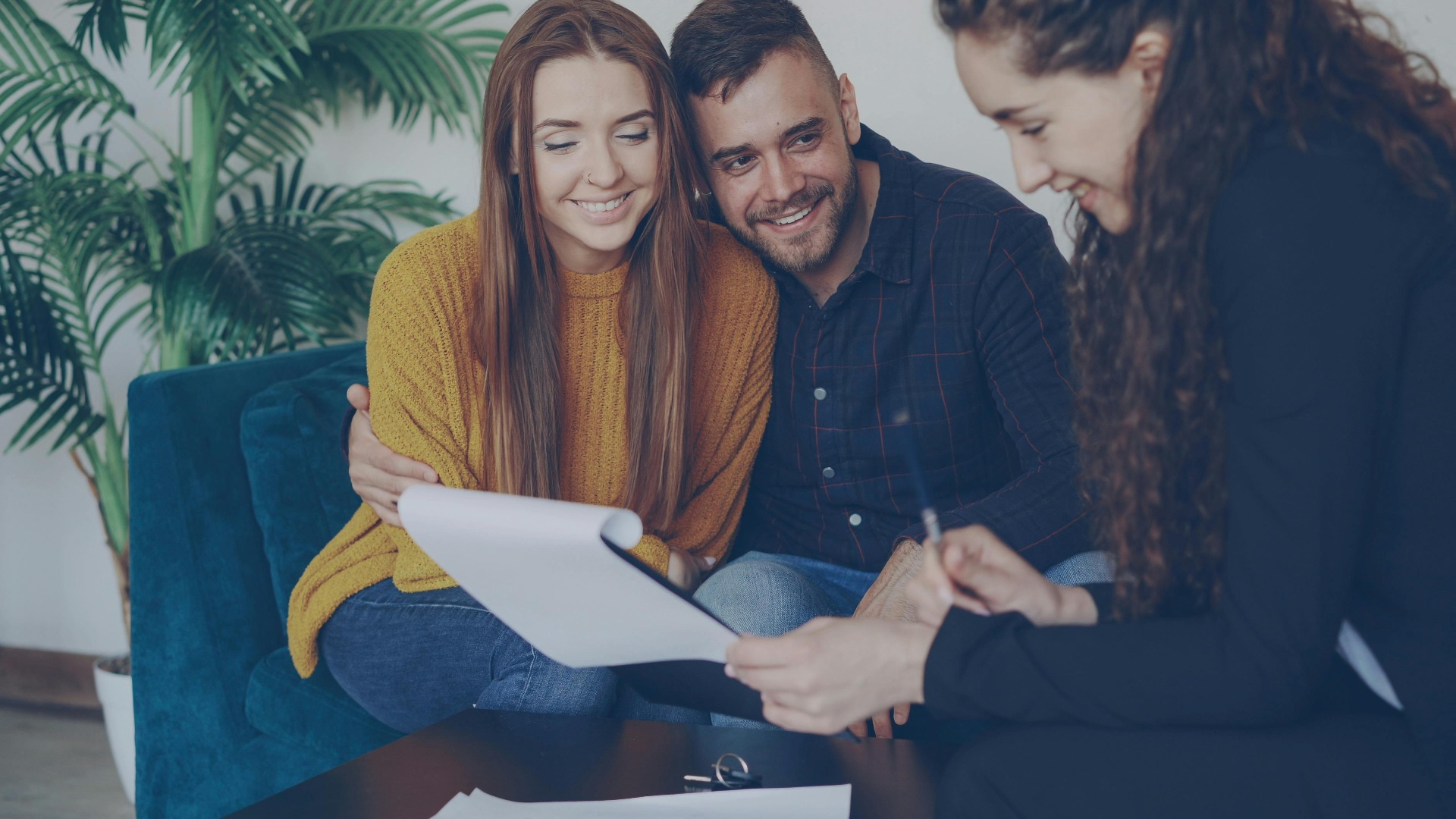 RHM Insurance Group agent meeting with a family